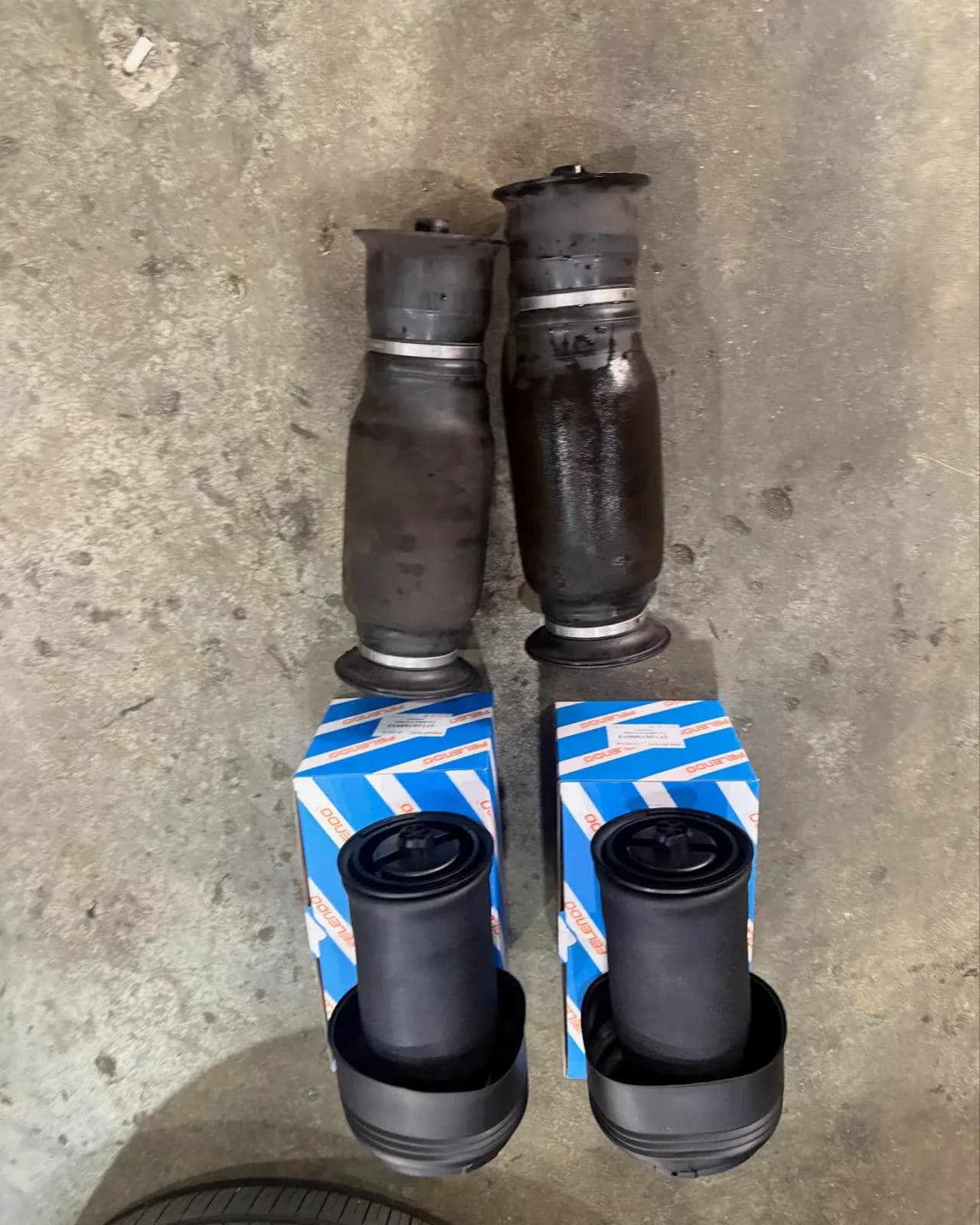 Removed and replacement rear air springs from the BMW X5 F15 repair