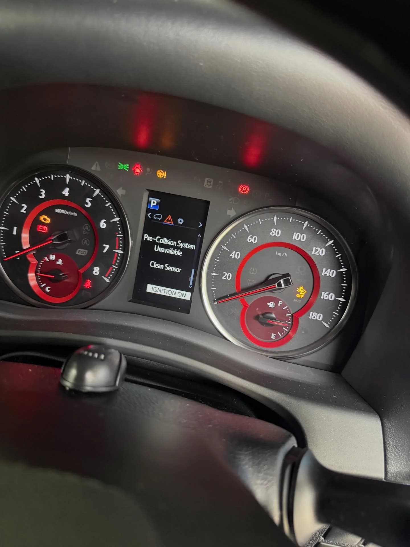 Toyota Alphard AGH30 dashboard showing a pre-collision system warning